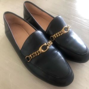 Beautiful and Unique Coach black and Gold logo Loafer.